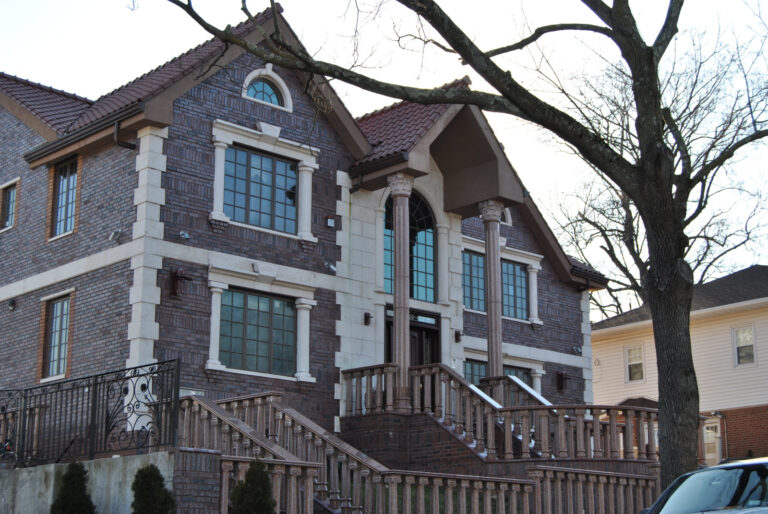 Contemporary textured precast facade at Henley Road Jamaica Estate by Mohan’s Precast